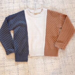 Hem and thread color block knit sweater